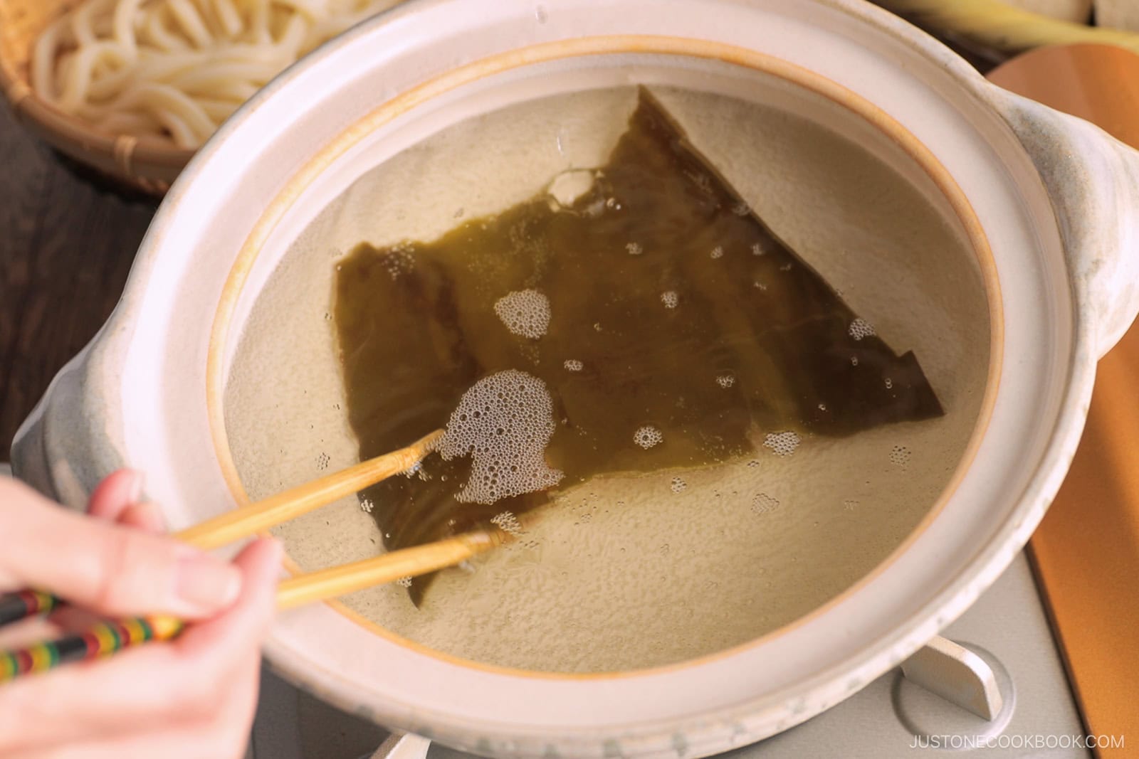 Slowly bring the kombu water to a simmer.