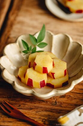 Fluted bowl containing Simmered Japanese Sweet Potatoes with Lemon.