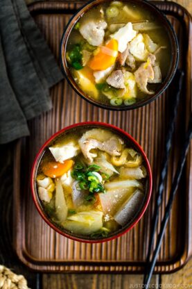 Wooden miso soup bowls containing Tonjiru (Pork and Vegetable Soup).